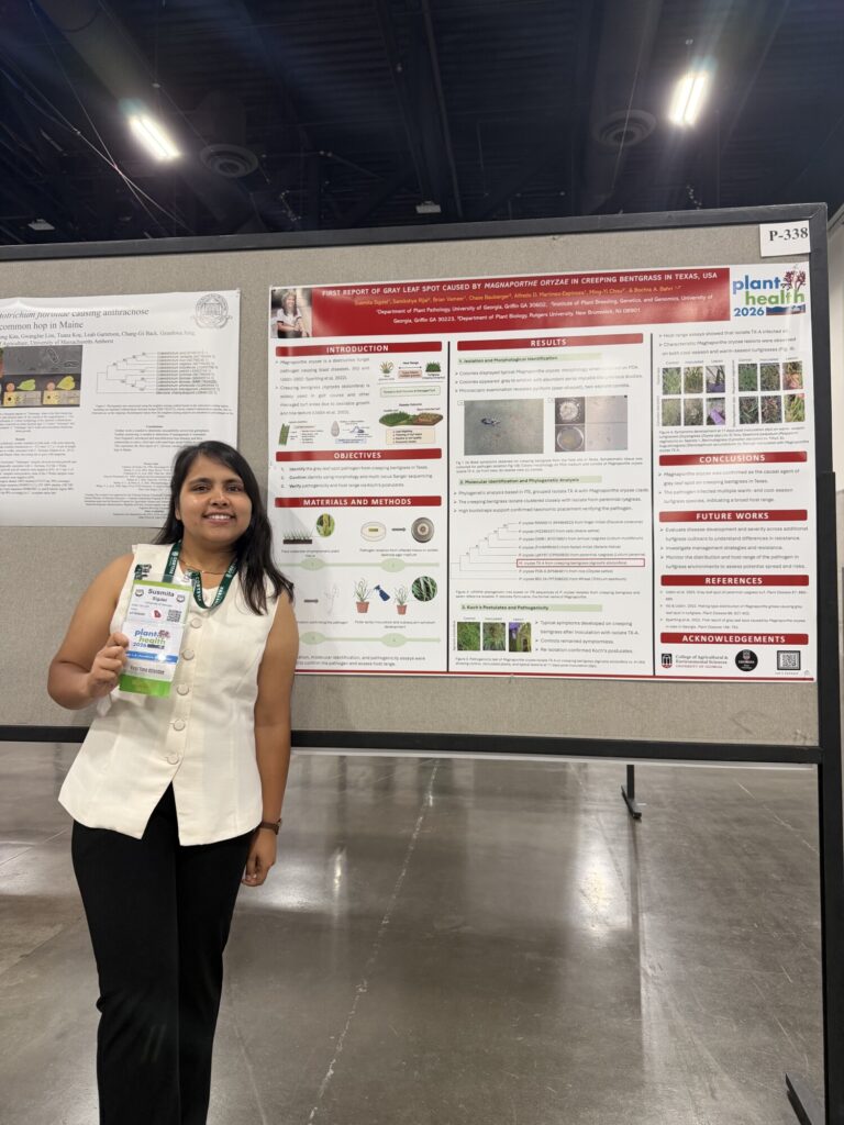 Susmita Sigdel infront of her Poster